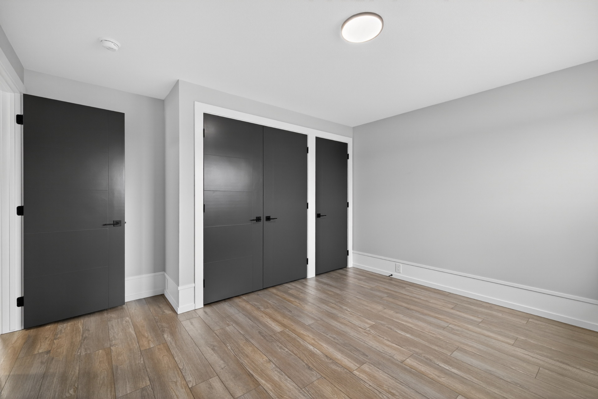 Upper Bedroom — Room to grow, with a triple-door closet · 13.4 × 11.3
