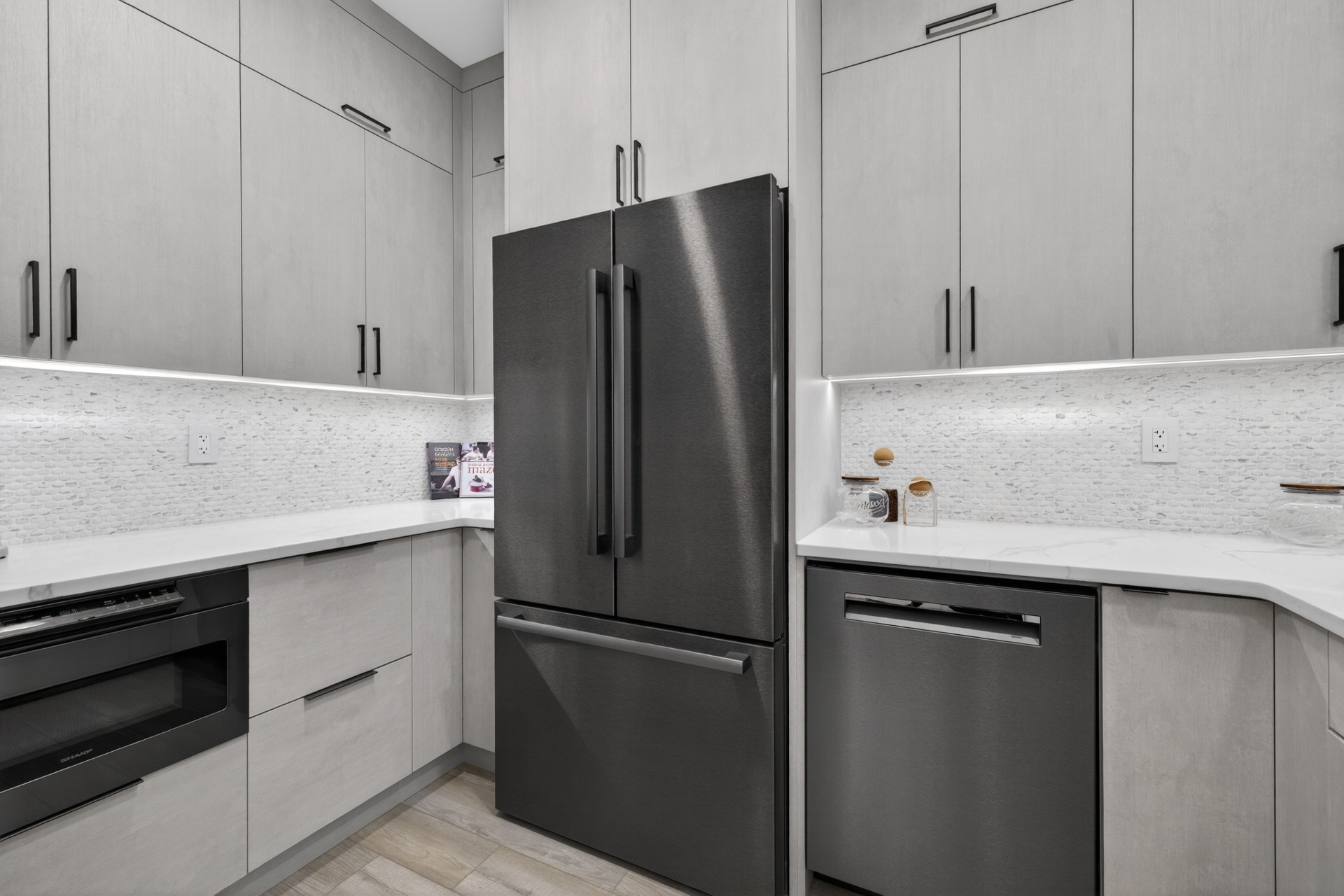 Family-ready butler's pantry view 1, with integrated appliances and custom cabinetry