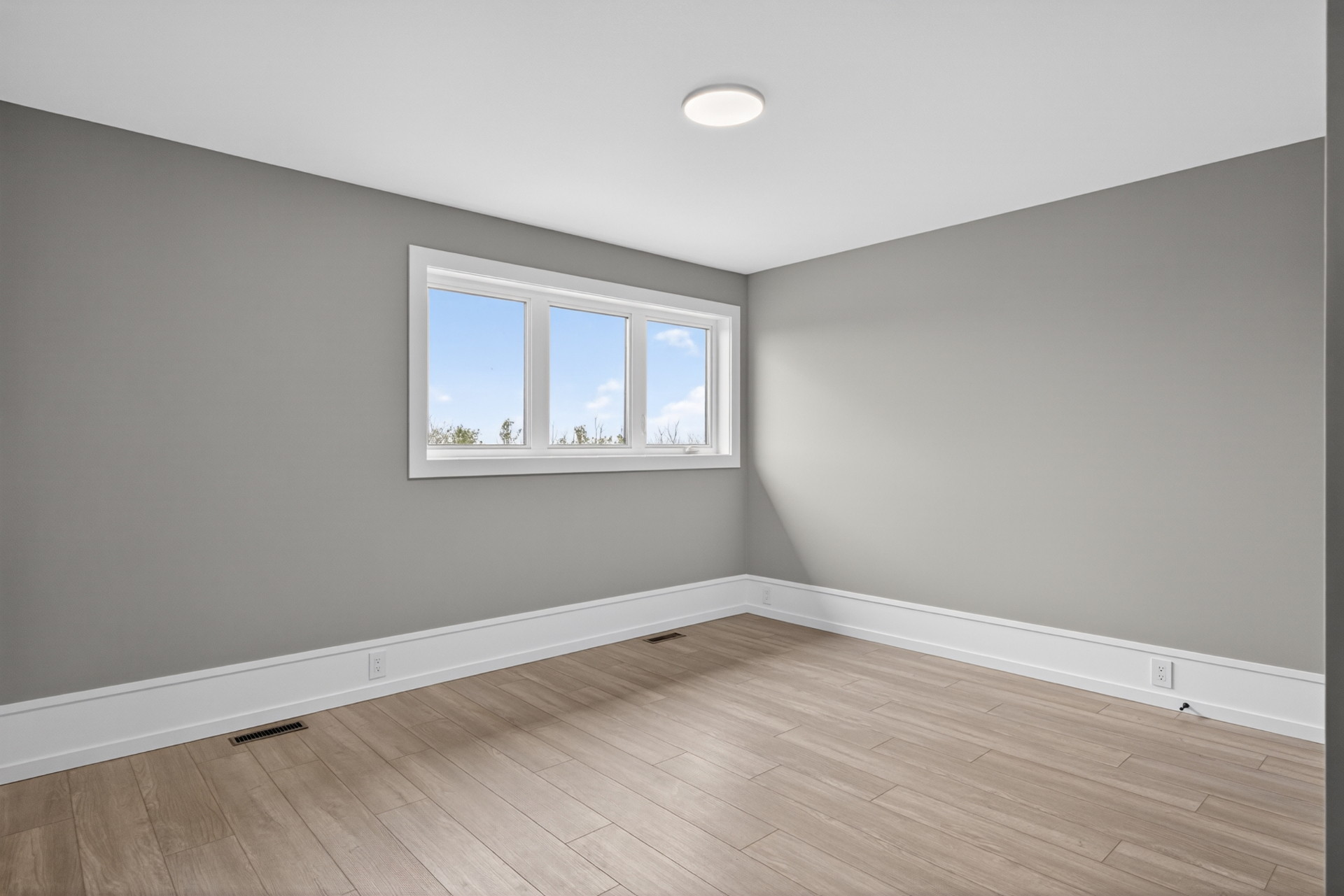 Upper Bedroom — Prairie views and plenty of floor space · 10.4 × 14.5